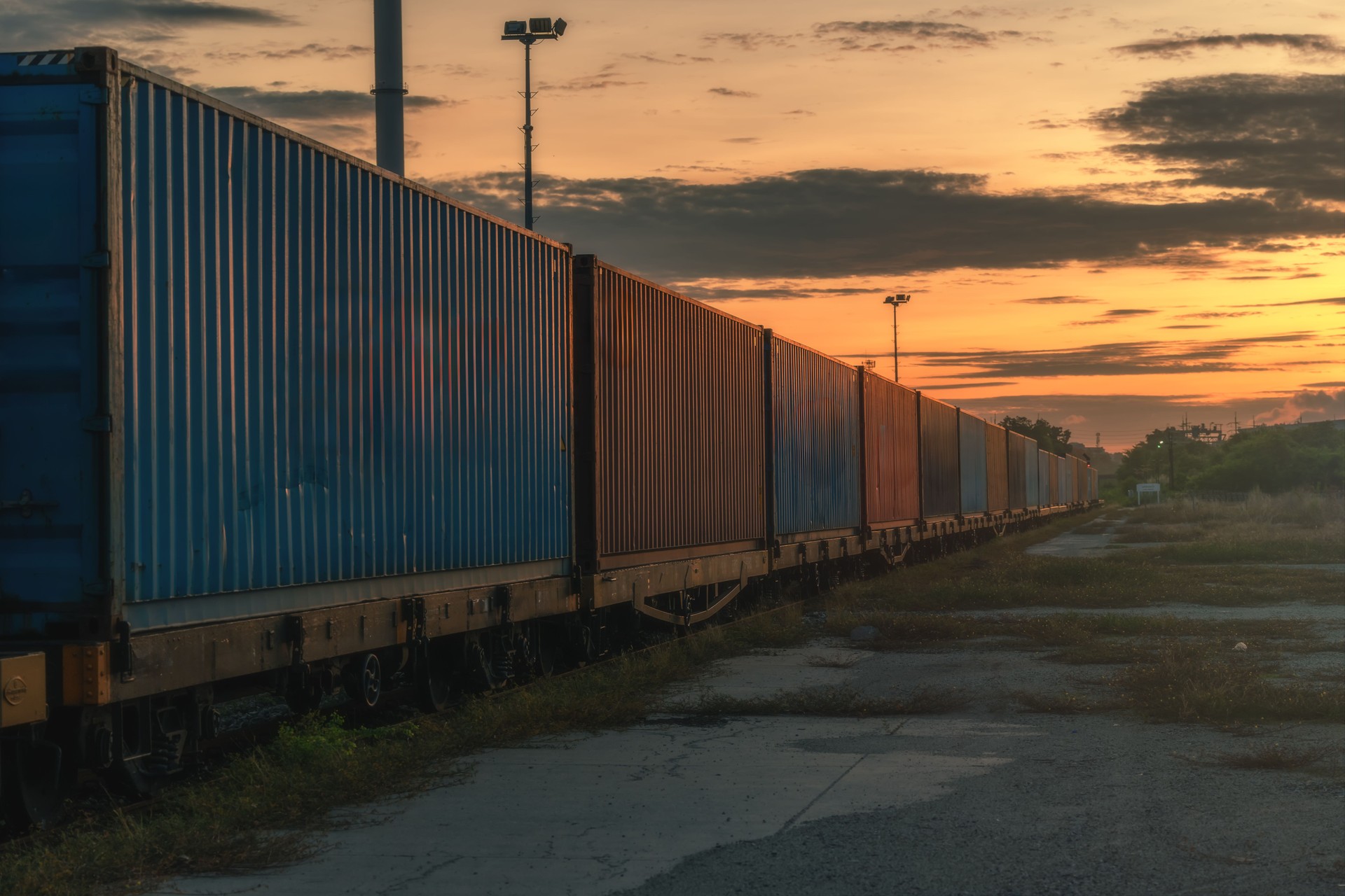Many containers are on trains that move on rails according to the rail transportation concept and drive the transportation industry.